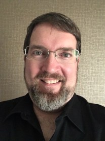 newest Paul Tuttle headshot (August 5, 2018).jpg